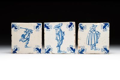 Three blue and white Dutch Delft tiles with oak leaf corners, 17th C.