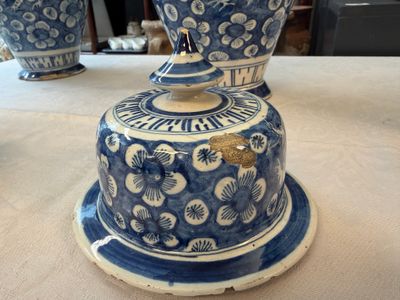 Three blue and white Dutch Delft vases and covers with dragons on a flowery ground — photo 1