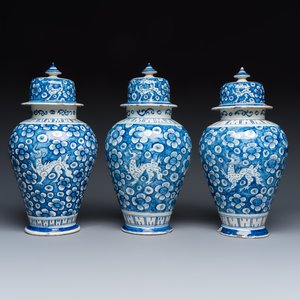 Three blue and white Dutch Delft vases and covers with dragons on a flowery ground — photo 2