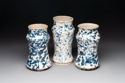 Three blue and white splash-glazed albarelli, Spain, 17th C.