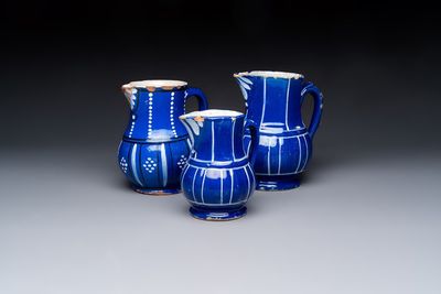 Three blue-ground faience jugs, probably Saint-Omer, North of France, 18/19th C.