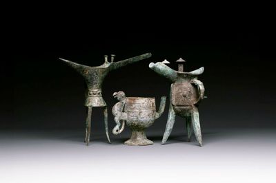Three Chinese archaic bronze wine vessels, Zhou or later