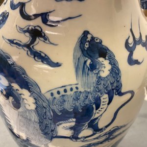 Three Chinese blue and white and celadon-ground 'Buddhist lion' vases, 19th C. — 照片 16