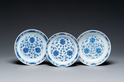 Three Chinese blue and white 'lotus scroll' plates, Guangxu mark and of the period