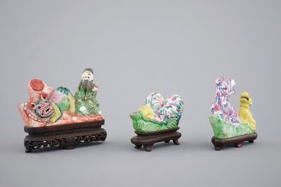 Three Chinese brush rests on wooden stands, 18th C.
