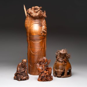 Three Chinese carved bamboo figures and a boxwood carving of a phoenix, 20th C. — photo 1