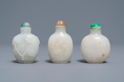 Three Chinese carved pale white jade snuff bottles, 19/20th C.
