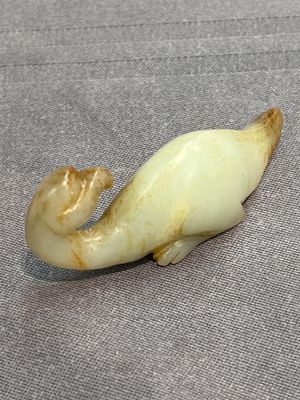 Three Chinese celadon and russet jade carvings of animals, 19th C. — photo 19