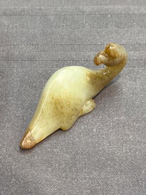 Three Chinese celadon and russet jade carvings of animals, 19th C. — photo 20