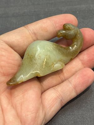 Three Chinese celadon and russet jade carvings of animals, 19th C. — photo 21