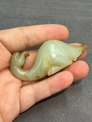 Three Chinese celadon and russet jade carvings of animals, 19th C. — photo 22