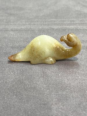 Three Chinese celadon and russet jade carvings of animals, 19th C. — photo 26
