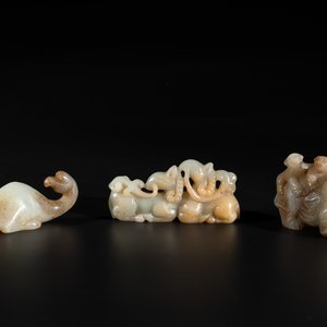 Three Chinese celadon and russet jade carvings of animals, 19th C. — photo 1