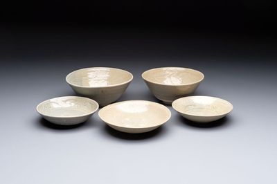 Three Chinese celadon-glazed plates and two bowls from the Jepara shipwreck, Fujian or Zhejiang kilns, Song