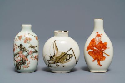 Three Chinese famille rose and iron red porcelain snuff bottles, 19th C.