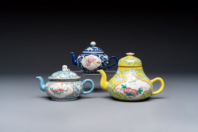 Three Chinese famille rose blue- and yellow-ground teapots and covers for the Straits or Peranakan market, Tongzhi marks, 19th C.