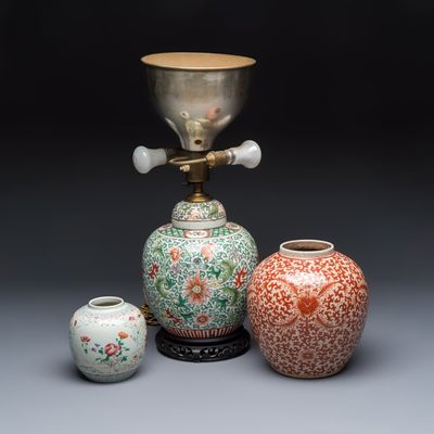 Three Chinese famille rose, verte and iron-red-decorated jars, one mounted as a lamp, 19th C.