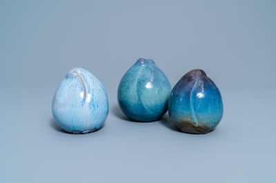 Three Chinese flambé-glazed shiwan models of peaches, 20th C.