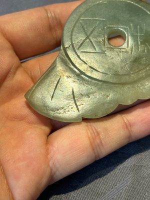 Three Chinese jades and an agate belt hook, Shang and later — photo 30