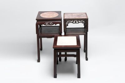 Three Chinese marble-topped hongmu stands, 19/20th C.