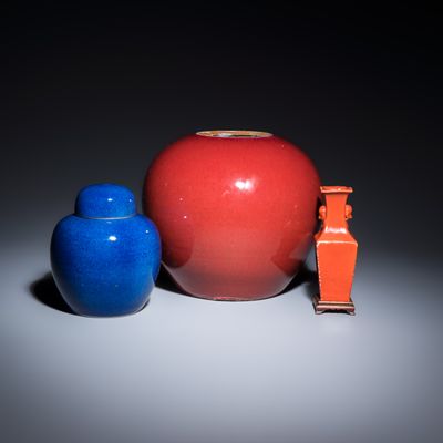 Three Chinese monochrome wares, one with a wooden stand, 19/20th C.