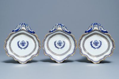 Three Chinese neo-classical gilt, blue and white tripod fruit dishes, Qianlong