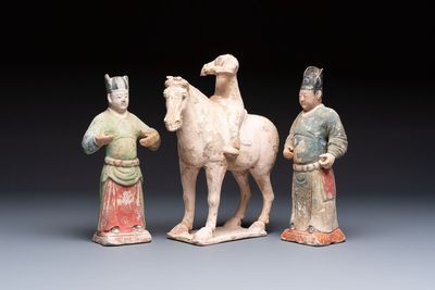 Three Chinese polychrome pottery figures, Sui/Ming