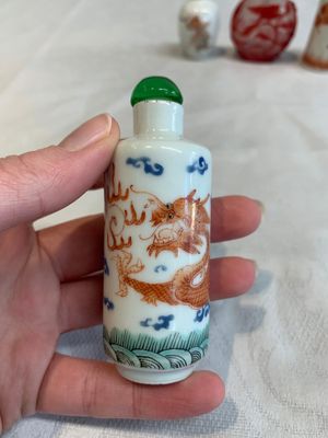Three Chinese porcelain snuff bottles and a red Peking glass snuff bottle, Daoguang and Tongzhi mark, 19th C. — photo 1
