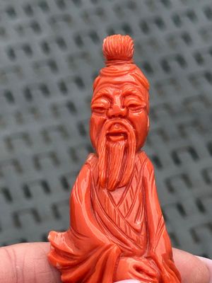 Three Chinese red coral carvings on wooden stands, 19/20th C. — photo 21