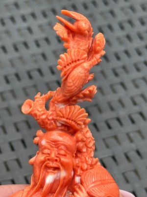 Three Chinese red coral carvings on wooden stands, 19/20th C. — photo 34