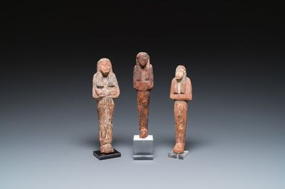 Three Egyptian polychromed wooden ushabtis, New Kingdom