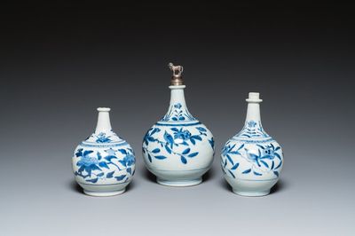 Three Japanese blue and white Arita 'birds among flowering branches' pharmacy bottles, Edo, 18th C.