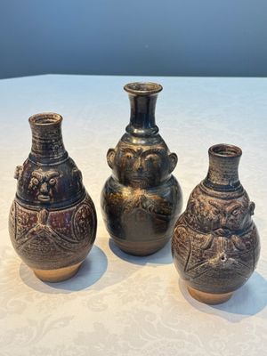 Three khmer-style brown-glazed anthropomorphic gourd-form bottles, probably 12/13th C. — photo 1