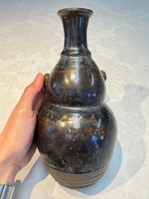 Three khmer-style brown-glazed anthropomorphic gourd-form bottles, probably 12/13th C. — photo 28