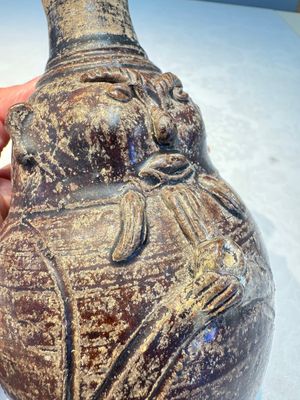 Three khmer-style brown-glazed anthropomorphic gourd-form bottles, probably 12/13th C. — photo 9