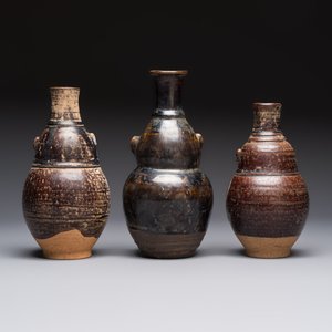 Three khmer-style brown-glazed anthropomorphic gourd-form bottles, probably 12/13th C. — photo 4