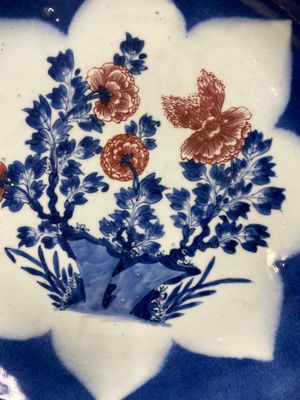 Three large Chinese blue, white and copper-red powder-blue-ground dishes with floral design, Kangxi — photo 18
