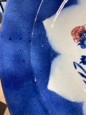 Three large Chinese blue, white and copper-red powder-blue-ground dishes with floral design, Kangxi — photo 21