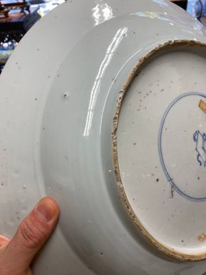 Three large Chinese blue, white and copper-red powder-blue-ground dishes with floral design, Kangxi — photo 24
