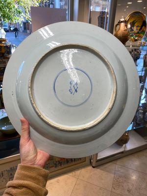 Three large Chinese blue, white and copper-red powder-blue-ground dishes with floral design, Kangxi — photo 5
