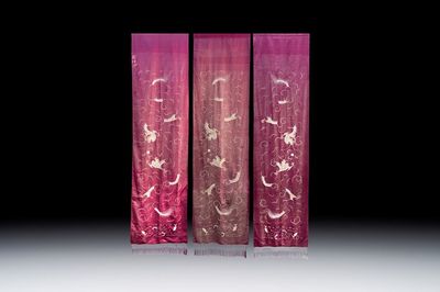 Three large Chinese purple-ground embroidered silk 'Dragons among Clouds' panels, 19th C.