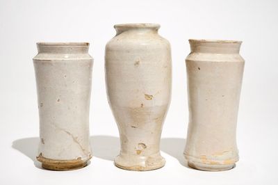 Three monochrome white maiolica albarelli, Italy, 17/18th C.