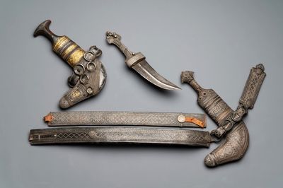 Three Omani Khanjars, one with Rhinoceros horn hilt, 19th C.