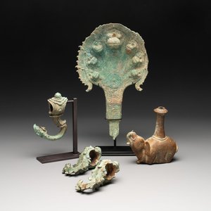 Three palanquin hooks, a bronze sculpture of naga Mucalinda and an elephant-form kendi, Cambodia, 13th C. and earlier — photo 1