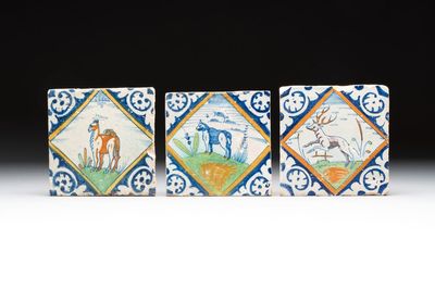 Three polychrome Dutch Delft 'animal' diamond tiles, 17th C.