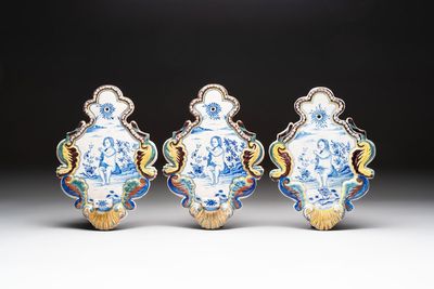 Three polychrome Dutch Delft wall sconces, 19th C.