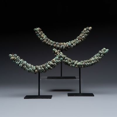 Three strings of Khmer bronze bells, Cambodia, Angkor Wat period, 12/13th C.