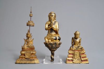 Three Thai gilt bronze, earthenware and wooden votive figures, 19th C.