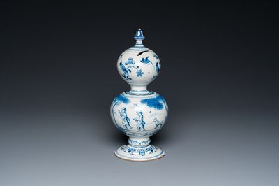 Tirelire de forme double gourde en faïence de Delft en bleu et blanc, datée 1732