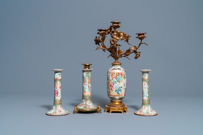 Trois bougeoirs en porcelaine de Chine famille rose de Canton et un vase à monture en bronze doré, 19ème